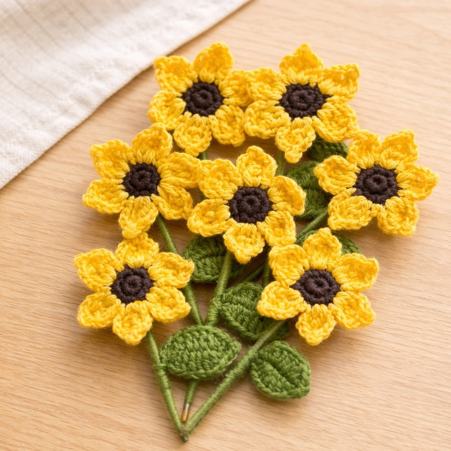 Crochet sunflower fridge magnets flatlay