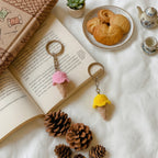 Crochet ice cream cone keychain flatlay, handmade in Toronto