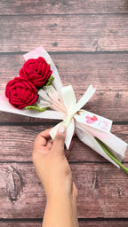 Pair of crochet red roses viewed from below, handmade bouquet from Toronto