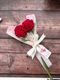 Pair of crochet red roses diagonal view, handmade bouquet from Looped Little Things