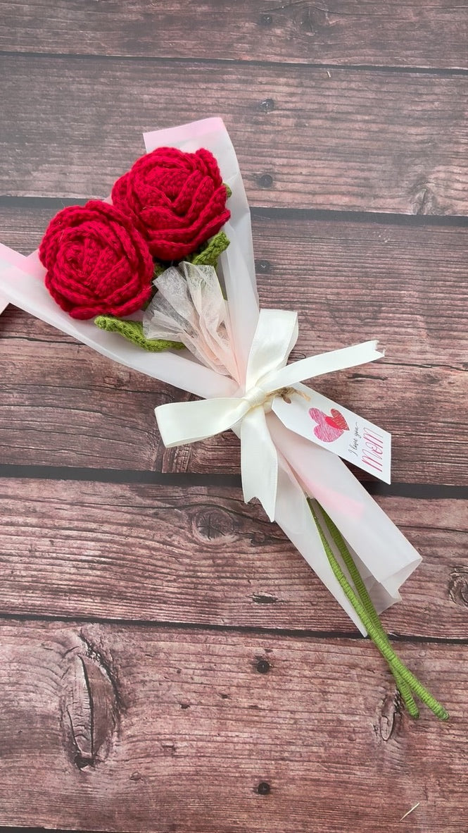 Pair of crochet red roses portrait view, handmade by Looped Little Things