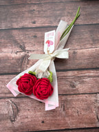 Crochet red rose stems close-up, handmade by Looped Little Things