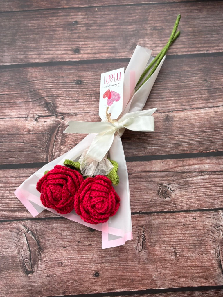 Crochet red rose stems close-up, handmade by Looped Little Things